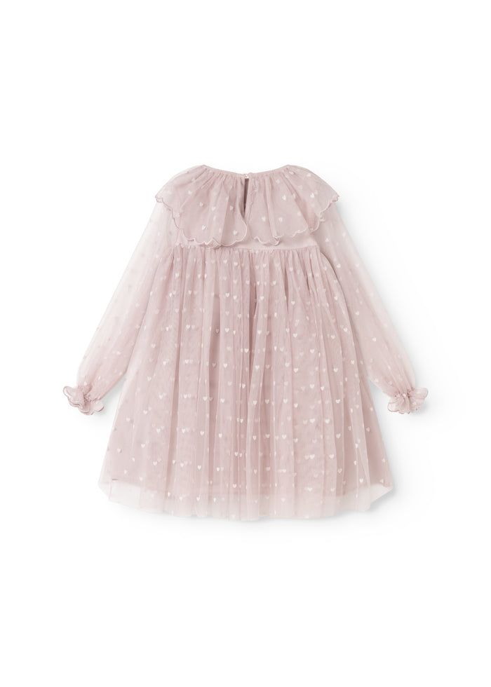 Light gray pink tulle dress with heart prints and long sleeves.
