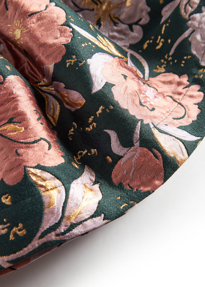Short dark green skirt with large flowers and bow detail for children