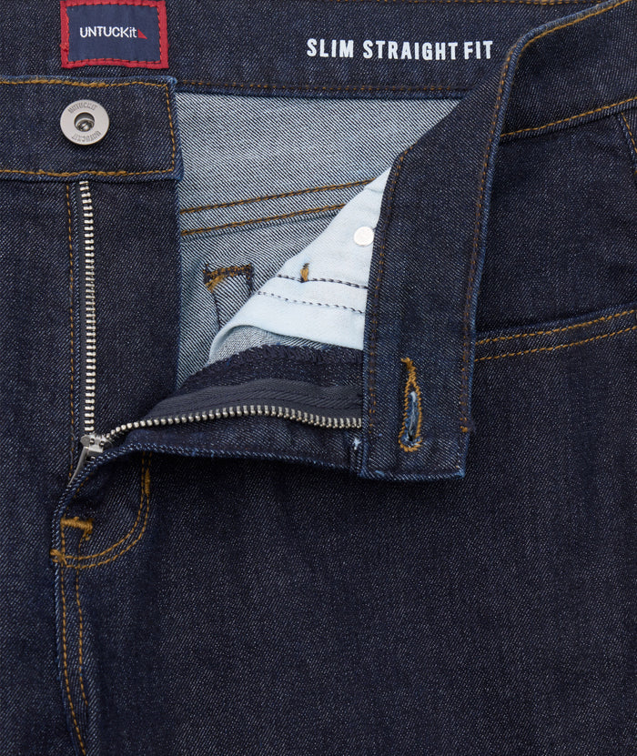 Model is wearing UNTUCKit Dark Wash Denim.