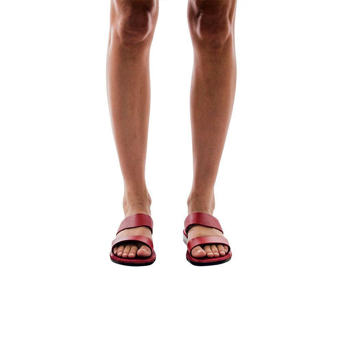 Model wearing Aviv red, handmade leather slide sandals