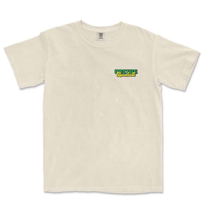 Cream-colored Comfort Colors T-shirt featuring a small, colorful "Cactus Baseball" logo on the upper left chest area.
