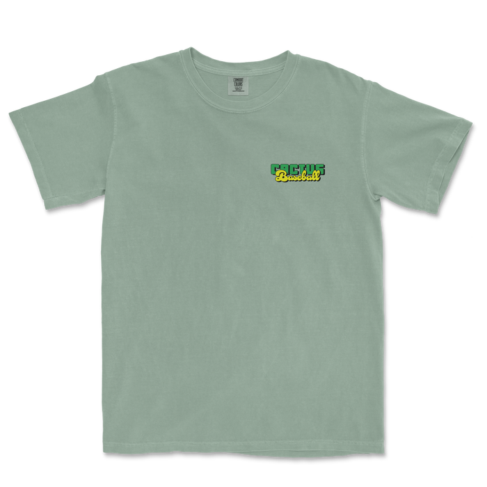 Light green Comfort Colors T-shirt with a small "Cactus Baseball" logo in green, yellow, and black on the upper left chest.