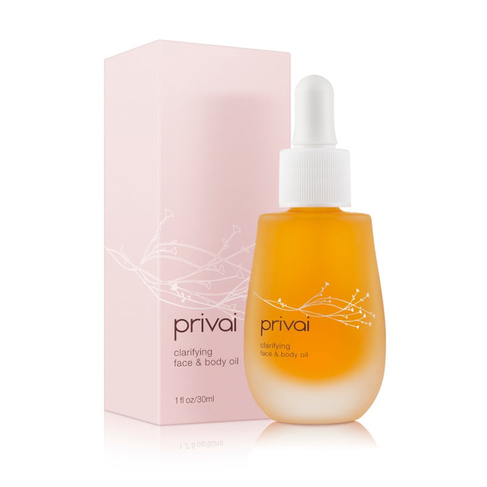 Clarifying Face & Body Oil | Privai in a frosted glass dropper bottle with pink packaging, designed for skincare and body care routines promoting clear, radiant skin.