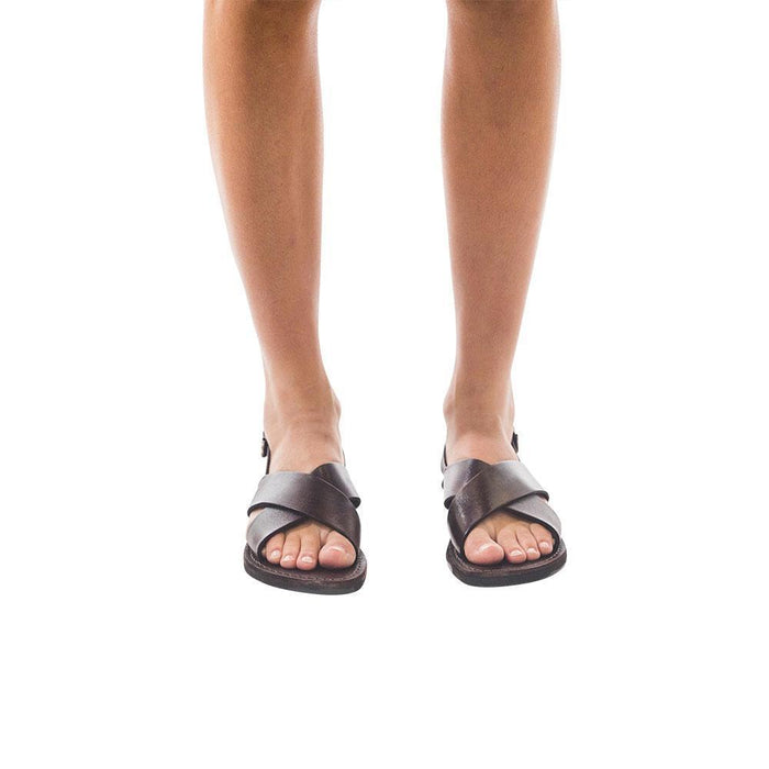 Model wearing Elan Buckle brown, handmade leather sandals with back strap - Front View