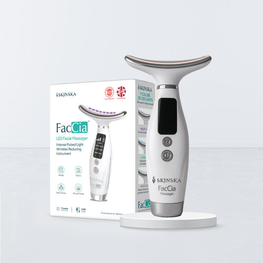 Skinska FacCia LED facial massager with packaging on a light gray background