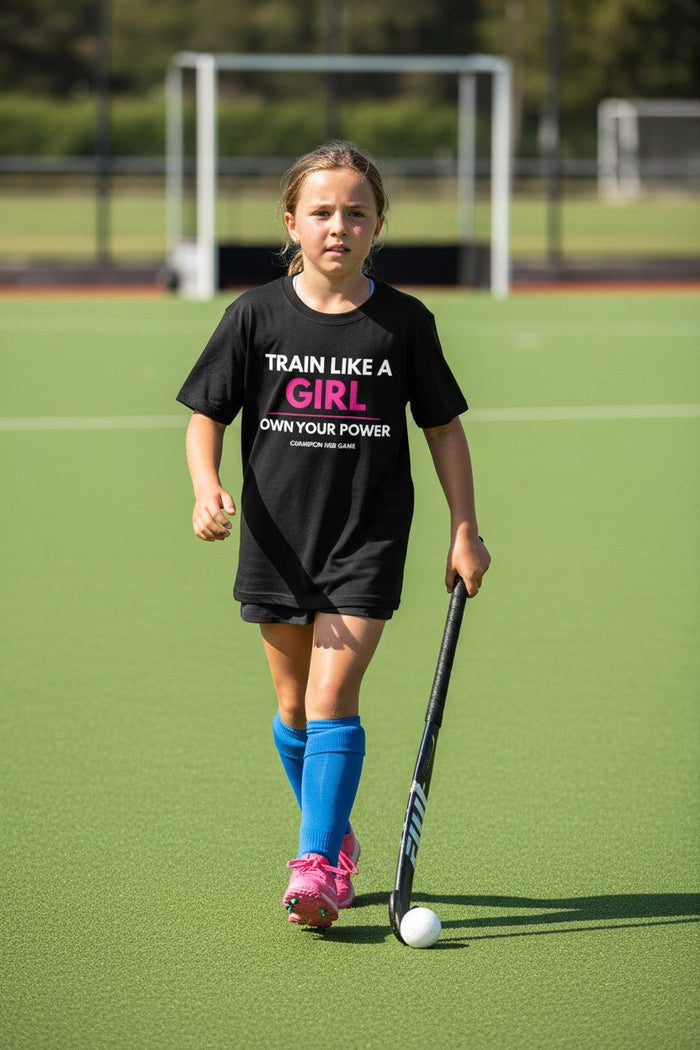 Girls field hockey training in Train Like a Girl t-shirt - High-performance youth sports apparel UK.