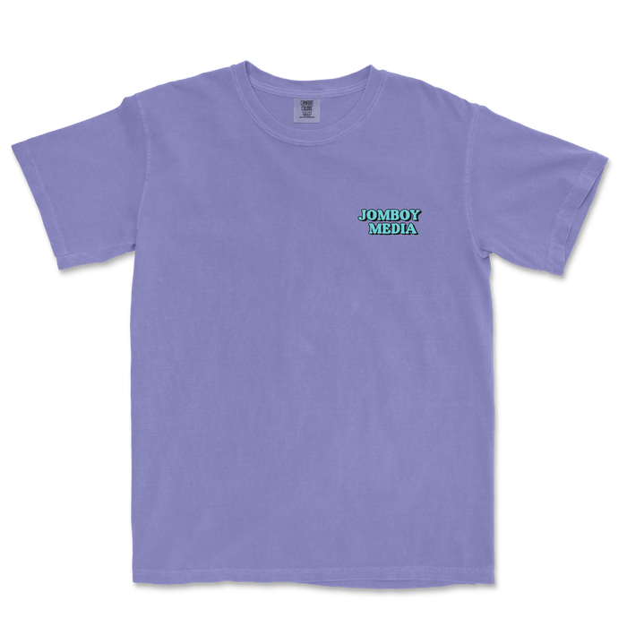 Lavender Comfort Colors T-shirt featuring a small "JOMBOY MEDIA" logo in turquoise and black on the upper left chest.
