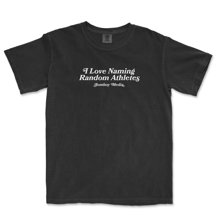 Black Comfort Colors T-shirt with white text that reads "I Love Naming Random Athletes" and "Jomboy Media" underneath.