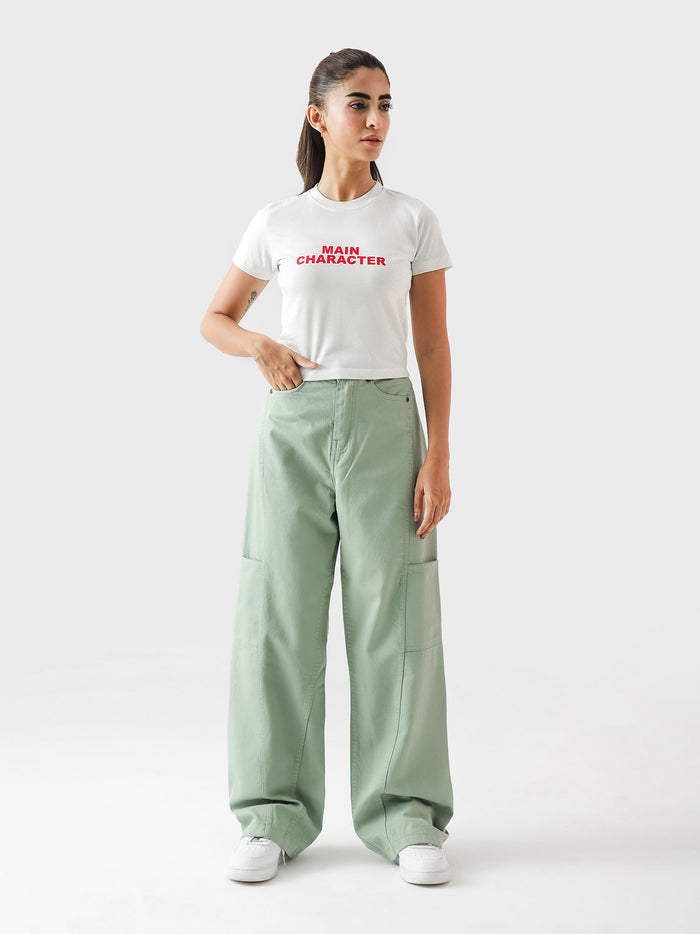 Main Character baby tee female model lifestyle shot graphic crop Pakistan – GROOVY