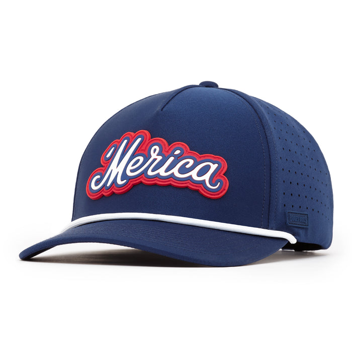 The Bogey Bros 'Merica Navy Performance Golf Rope Hat is a blue snapback with "Merica" in white script outlined in red, a white trim above the brim, sweat stain-resistant material, and perforated side panels. Shown on a plain white background.