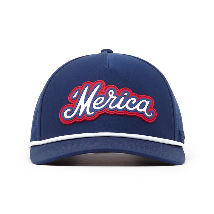 The Bogey Bros 'Merica Navy Performance Golf Rope Hat is a structured snapback with white piping on the visor and “Merica” embroidered in white script with a red outline. Crafted from performance material, it delivers comfort and style for golfers.
