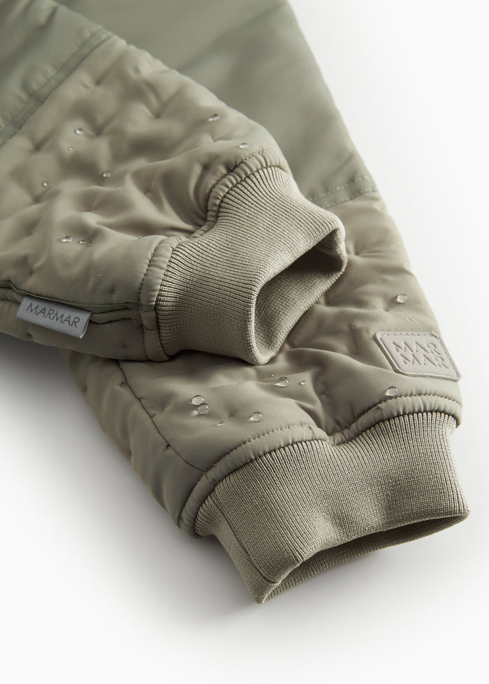 Green thermal pants for children