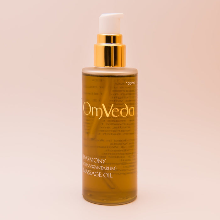 Harmony body oil 100 ml bottle with gold pump, amber liquid, front label