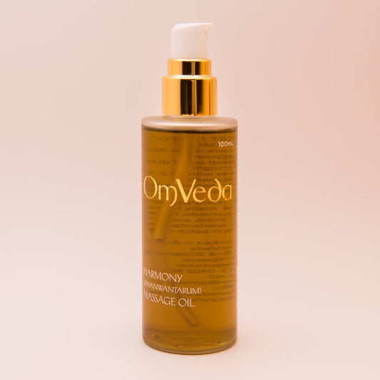 Harmony body oil 100 ml bottle with gold pump, amber liquid, front label