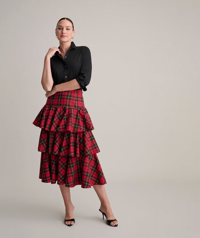 Model is wearing UNTUCKit Gretl plaid skirt.