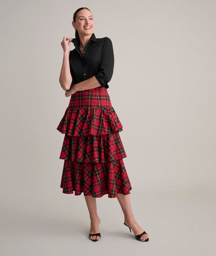 Model is wearing UNTUCKit Gretl plaid skirt.