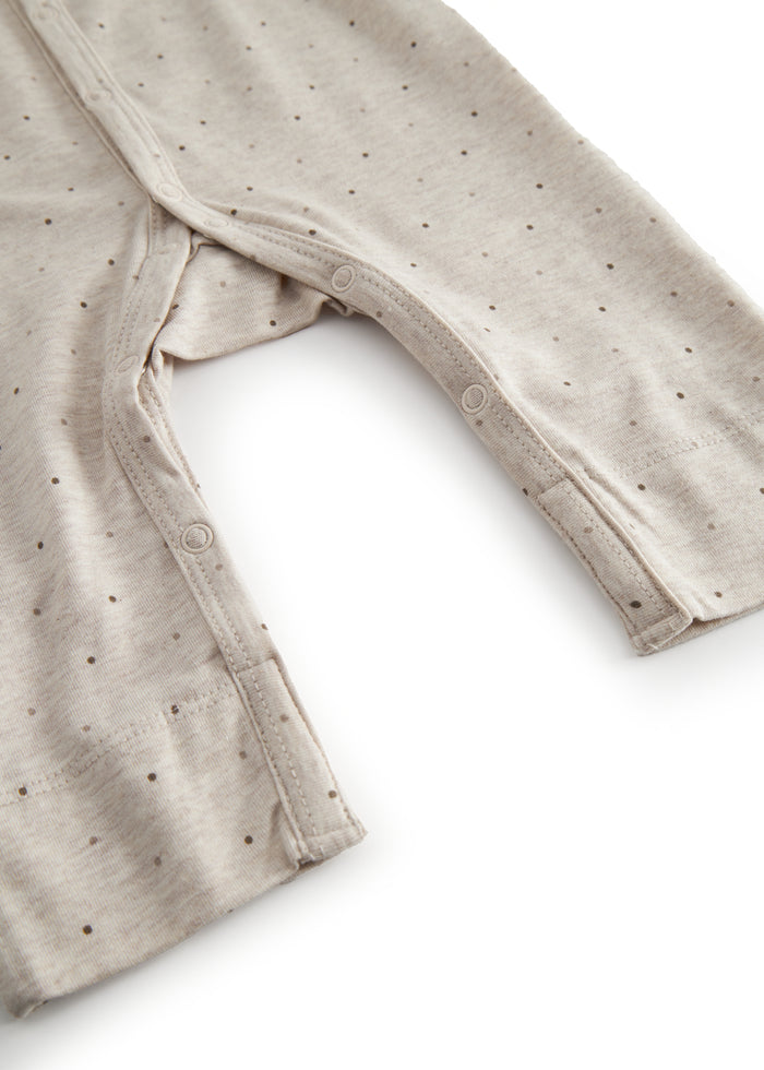 Beige long-sleeved baby outfit with buttons