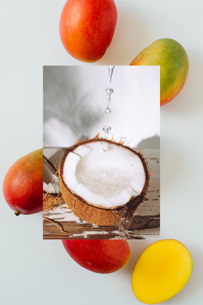 Mangoes Cut in Half and Open Raw Coconut Half