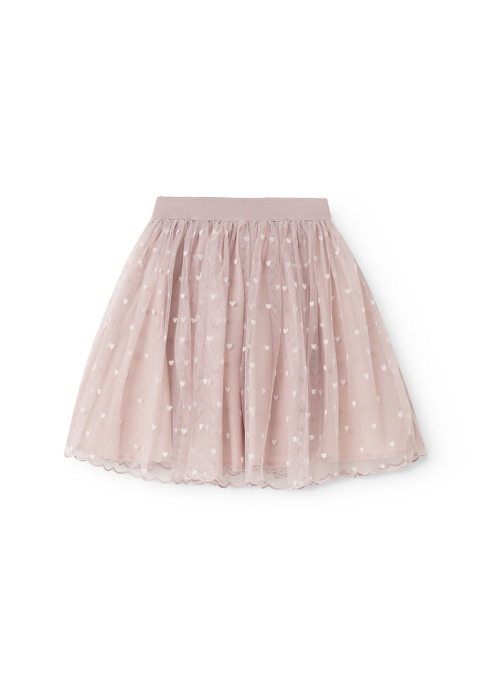 Pink skirt with small white hearts and elastic at the waist, sway in the skirt.