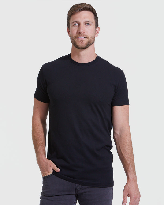Staple Tall Straight Hem Crew Neck T-Shirt worn by a relaxed man.