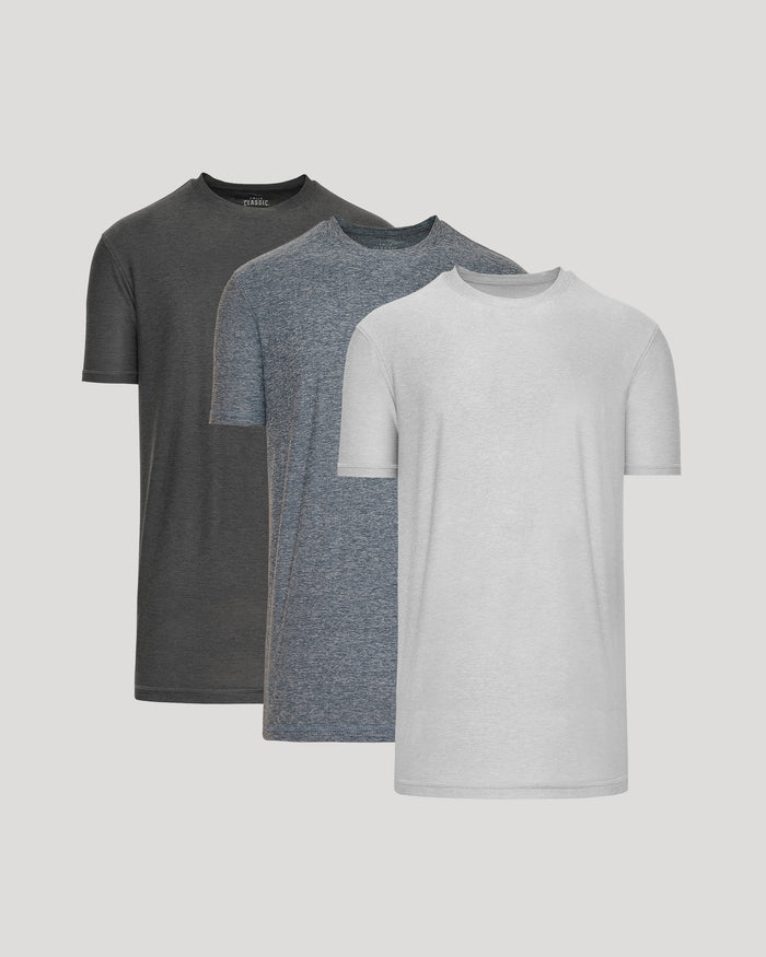 Three gray t-shirts in different shades on a light gray background