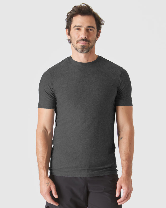 Man wearing Staple Tall Active Crew T-shirt, showcasing casual fit.