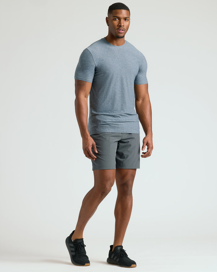 Heather Navy Tall Active Crew Neck 2.0 worn by man, showcasing fit.