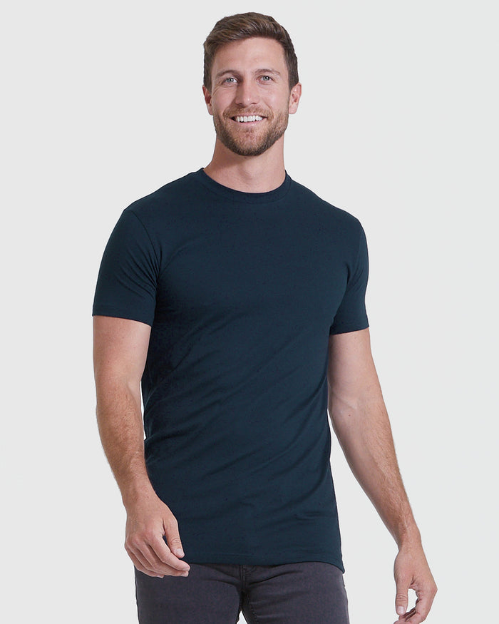 Man wearing a navy Tall Straight Hem Crew Neck T-Shirt 10-Pack, smiling with a relaxed fit that showcases classic men's basics style.