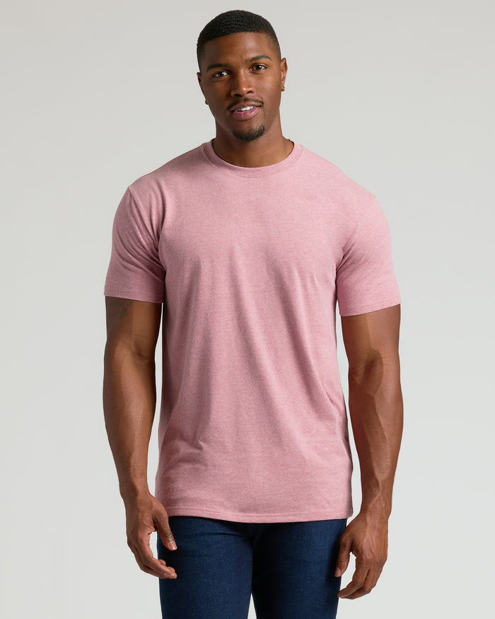 Man wearing a light heather boysenberry colored Tall Straight Hem Crew Neck T-Shirt 10-Pack with a classic fit and short sleeves, styled as a men's basic essential.