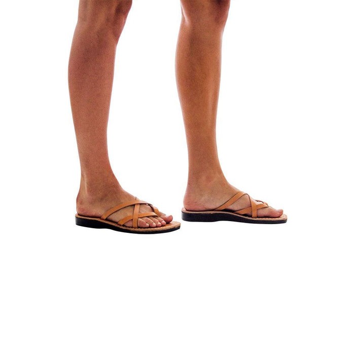 Model wearing Tamar tan, handmade leather slide sandals