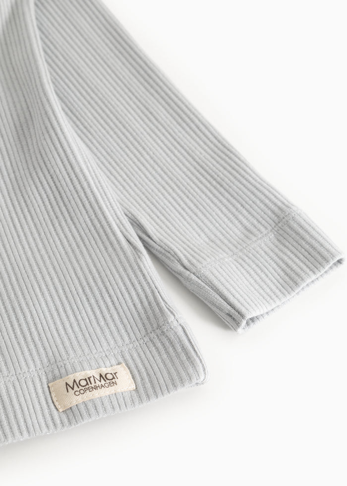 Light gray ribbed T-shirt with MarMar Copenhagen brand at the cuff.