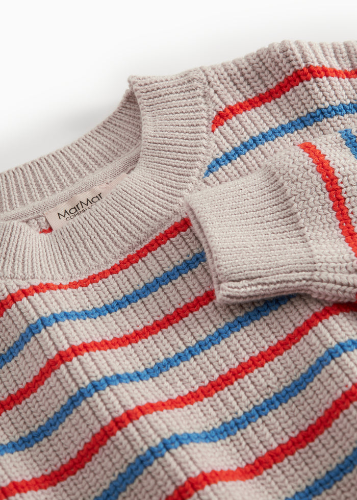 Striped t-shirt for children in beige with blue and red stripes.