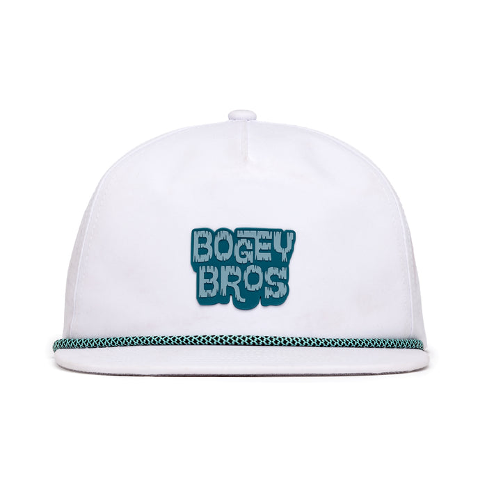 The Tiki Flat Bill is an unstructured flat bill hat made from performance material, with a braided teal and white rope above the brim. It has an adjustable snapback and bold teal BOGEY BROS lettering on a light blue background.