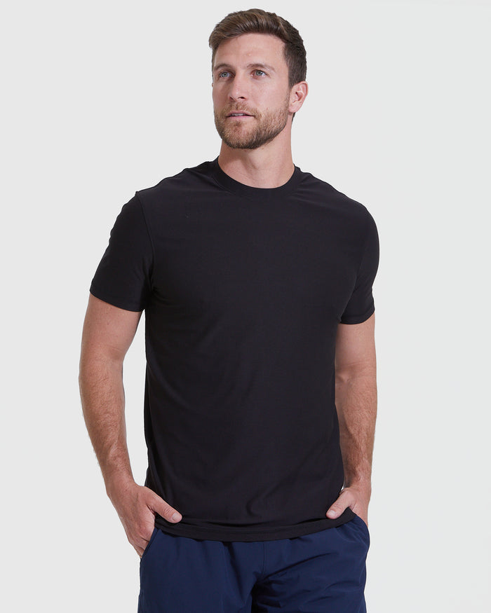 Man wearing Timeless Tall Active Crew T-shirt and dark pants.