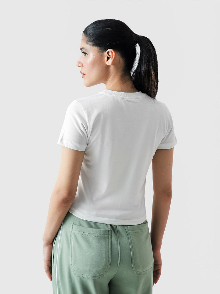 Top Tier Yapper baby tee female model lifestyle shot cropped graphic Pakistan – GROOVY