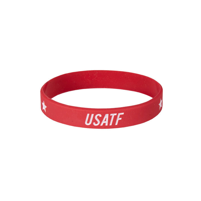 Red wristband with 'USATF' text on a white background
