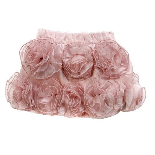 Vivian dusty pink organza skirt for girls featuring large organza floral appliqués, a lightweight airy silhouette, and an elegant knee-length fit.