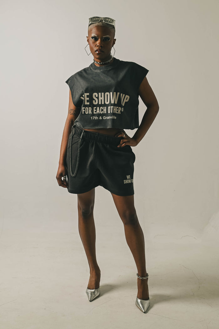 We Show Up Tanktop Cut and styled with shorts.