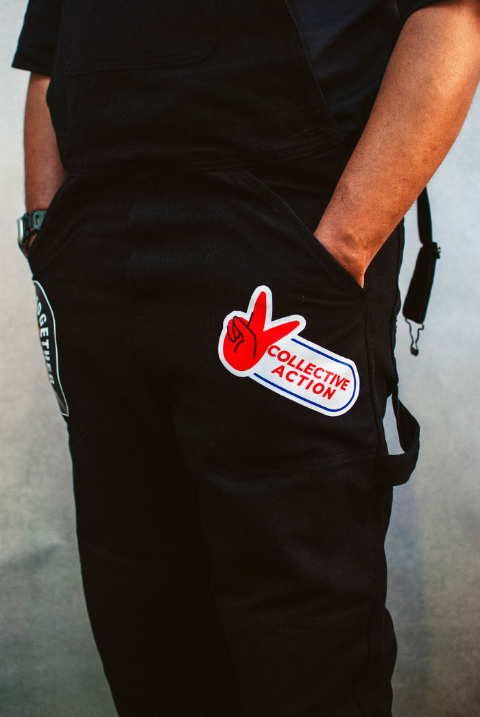 Close up of the We Us overalls showing the Collective Action patch.”