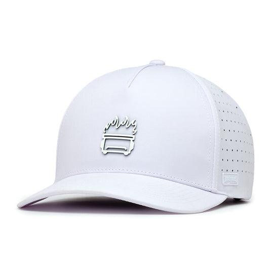 The White Hot - Performance Golf Hat - Snapback is a white cap made from performance material, featuring perforated side panels, a raised flame logo above a rectangle on the front, curved brim, snapback closure, and a small logo tag by the brim.