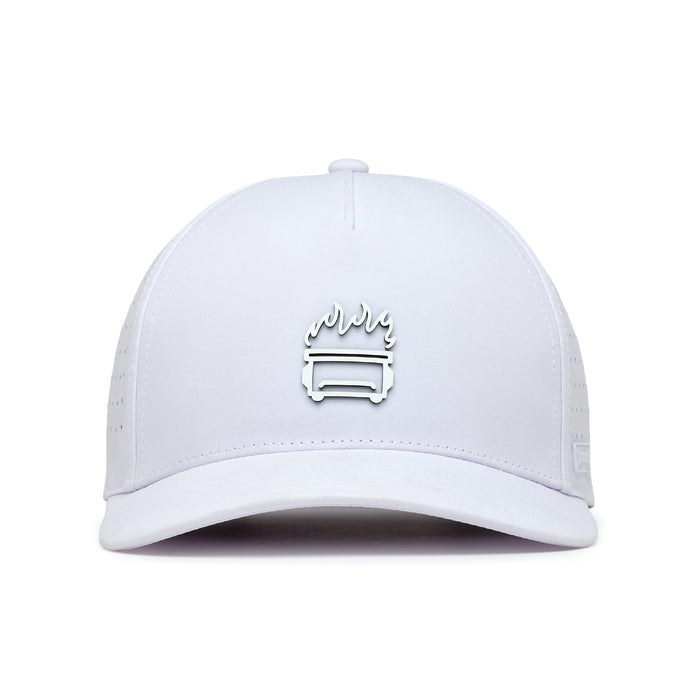 The White Hot - Performance Golf Hat - Snapback is shown from the front, featuring a small embroidered grill with flames on the crown. Made from performance material, it’s sweat stain resistant with side vents and a curved brim.
