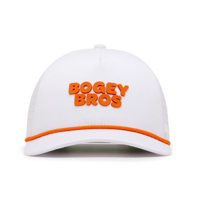 The Wingin' It Performance Golf Rope Hat is a white snapback with bold, raised orange BOGEY BROS text on the front, orange trim on the brim, small ventilation holes, and a plain white background.