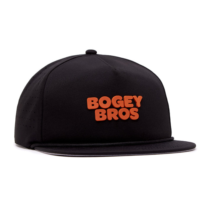 The "Wingin' It - Unstructured Flat Bill Hat - Snapback" is a black hat with bold, raised orange “BOGEY BROS” lettering on the front. Made from performance material, its adjustable snapback highlights an unstructured flat bill design.