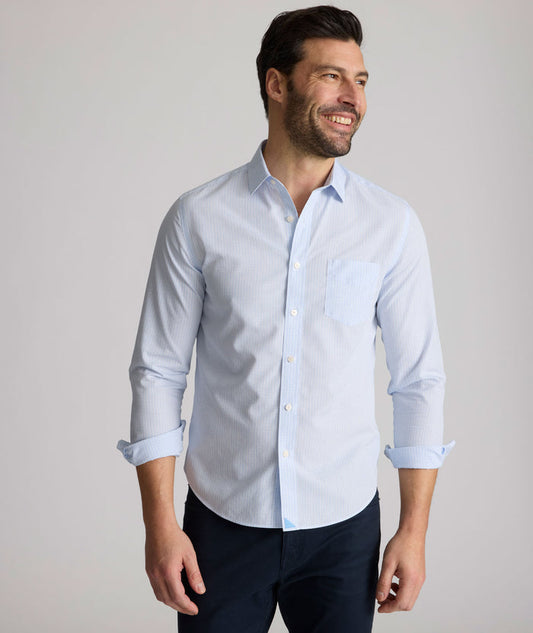 Model is wearing UNTUCKit Halstead wrinkle-free shirt.