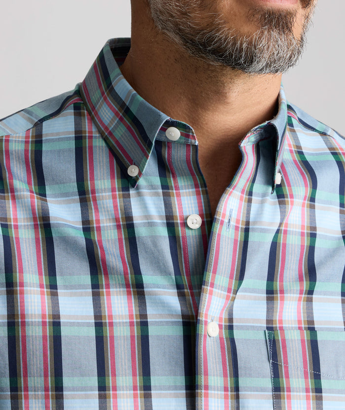 Model is wearing UNTUCKit Wrinkle-Free Morales Shirt in blue.