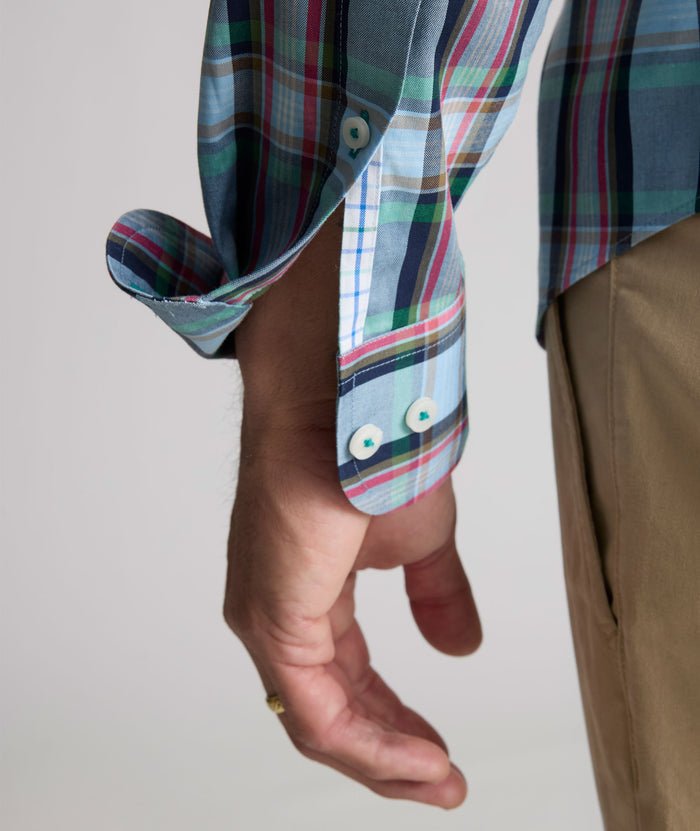 Model is wearing UNTUCKit Wrinkle-Free Morales Shirt in blue.