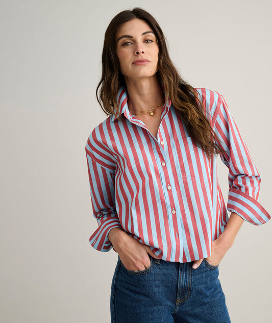 Model is wearing UNTUCKit Crosby shier in red and blue stripes.